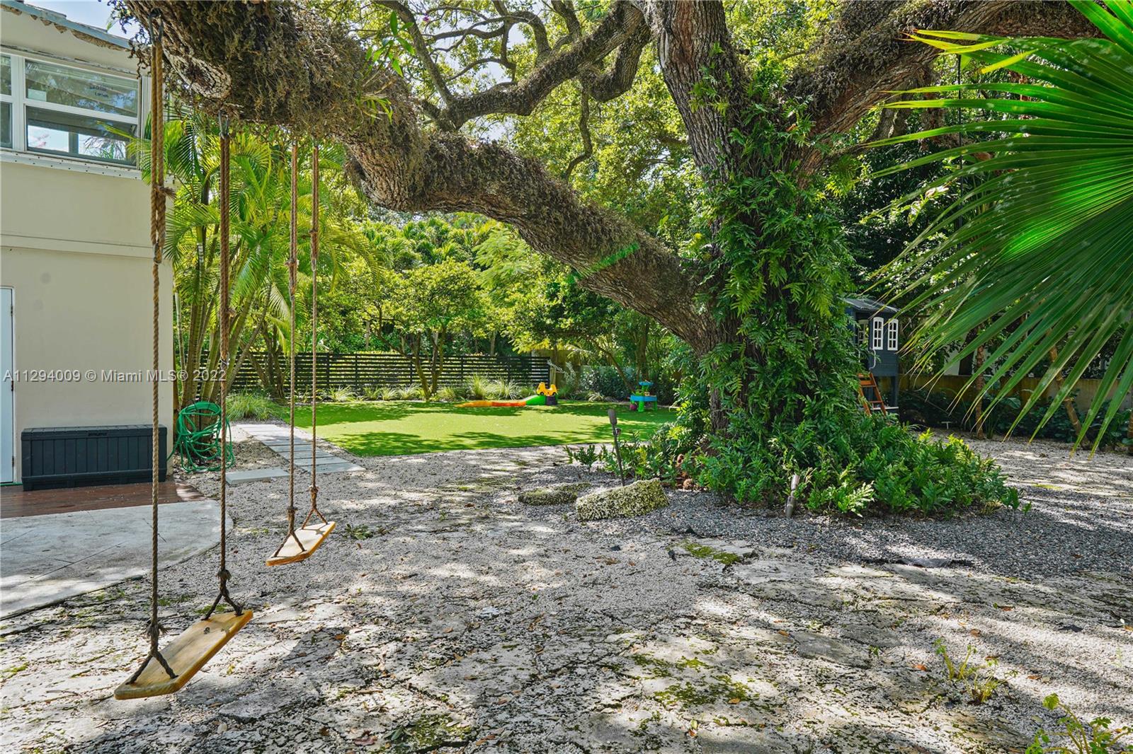1701 Micanopy Avenue Miami, FL 33133 - Photo 39 of 46 a view of a park with a tree