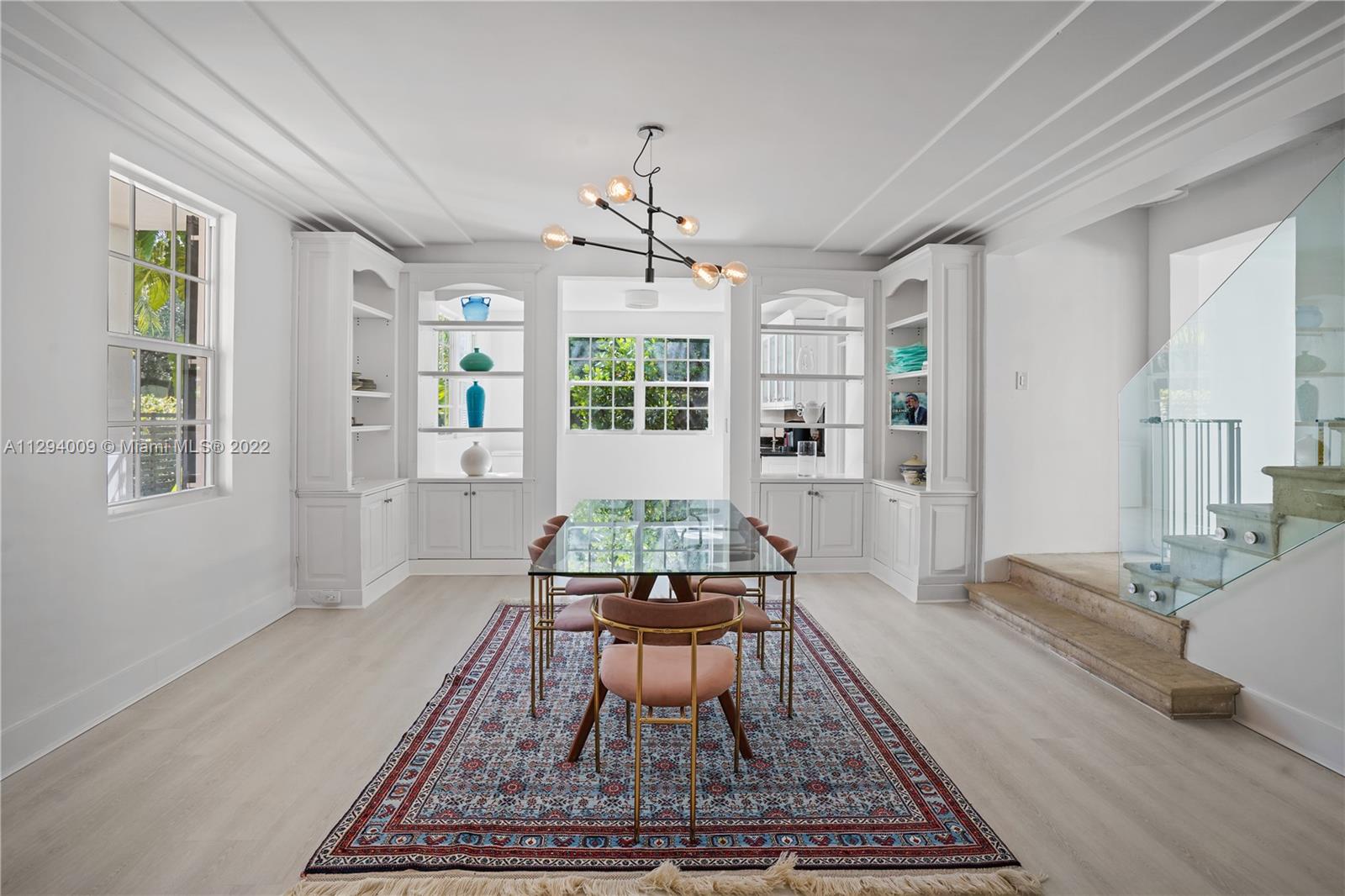 1701 Micanopy Avenue Miami, FL 33133 - Photo 7 of 46 a living room with furniture rug and window