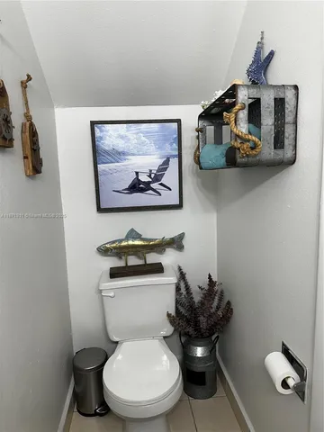 a bathroom with a toilet and a sink