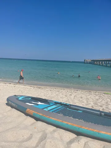 a kitchen with granite countertop a stove and a sink