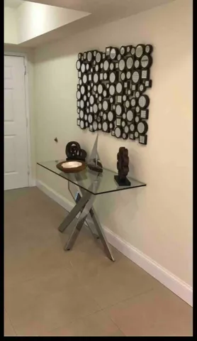 a bedroom with a bed and flat screen tv