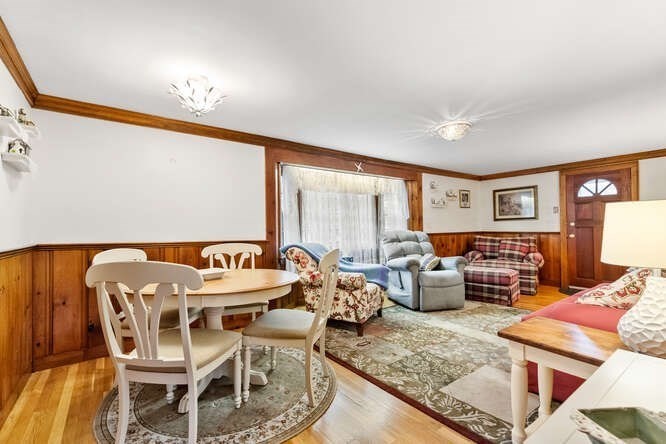 115 Quinn Road Lynn, MA 01904 - Photo 11 of 38 a living room with furniture and a large window