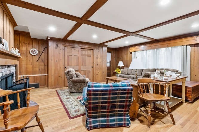 115 Quinn Road Lynn, MA 01904 - Photo 16 of 38 a living room with furniture a rug and a window
