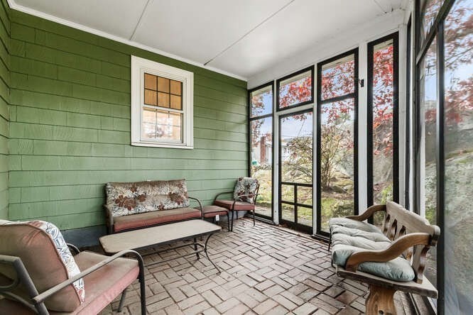 115 Quinn Road Lynn, MA 01904 - Photo 20 of 38 a living room with furniture and large windows