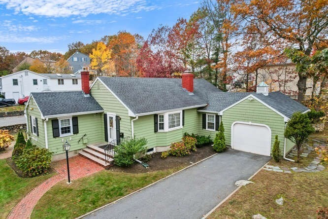 115 Quinn Road Lynn, MA 01904 - Photo 2 of 38 front view of a house with a yard