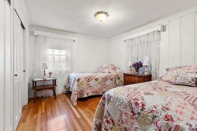 115 Quinn Road Lynn, MA 01904 - Photo 21 of 38 a bedroom with two beds and a window