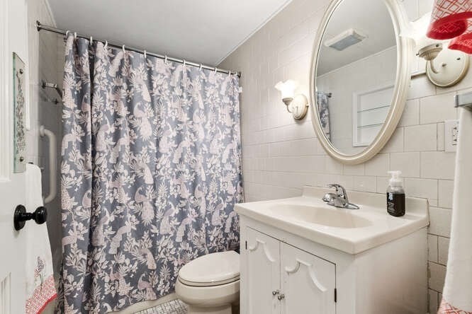 115 Quinn Road Lynn, MA 01904 - Photo 23 of 38 a bathroom with a sink toilet and a mirror
