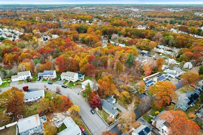 115 Quinn Road Lynn, MA 01904 - Photo 28 of 38 an aerial view of a city with lots of residential buildings