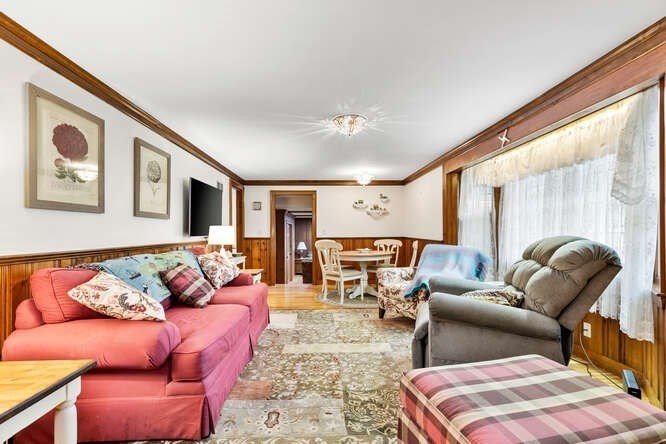 115 Quinn Road Lynn, MA 01904 - Photo 9 of 38 a living room with furniture and a large window