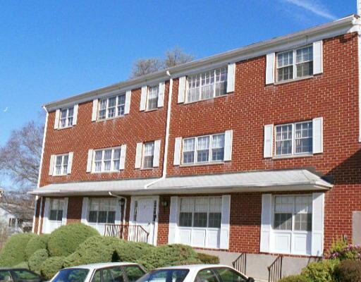 57 Greenhouse Road, Unit D Bridgeport, CT 06606 - Photo 1 of 1 a front view of a house