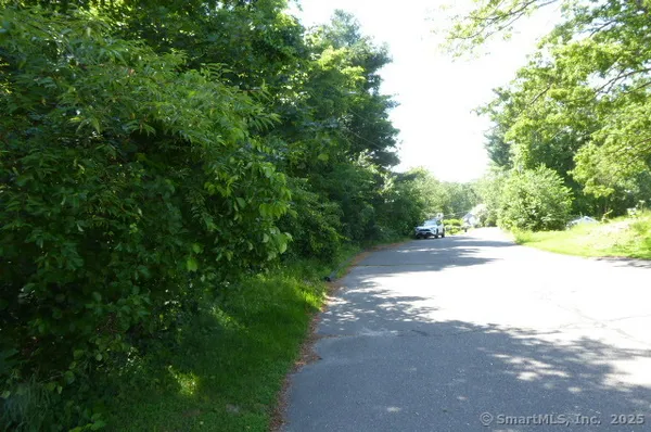a view of street view with a yard