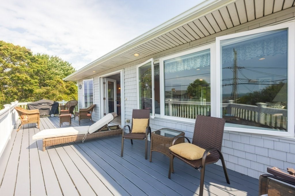 91 Balsam Street Fairhaven, MA 02719 - Photo 20 of 39 a balcony with wooden floor and furniture