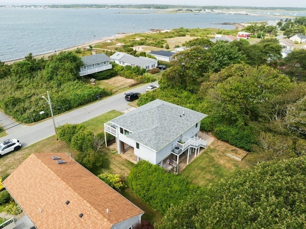 91 Balsam Street Fairhaven, MA 02719 - Photo 2 of 39 an aerial view of a house with a yard