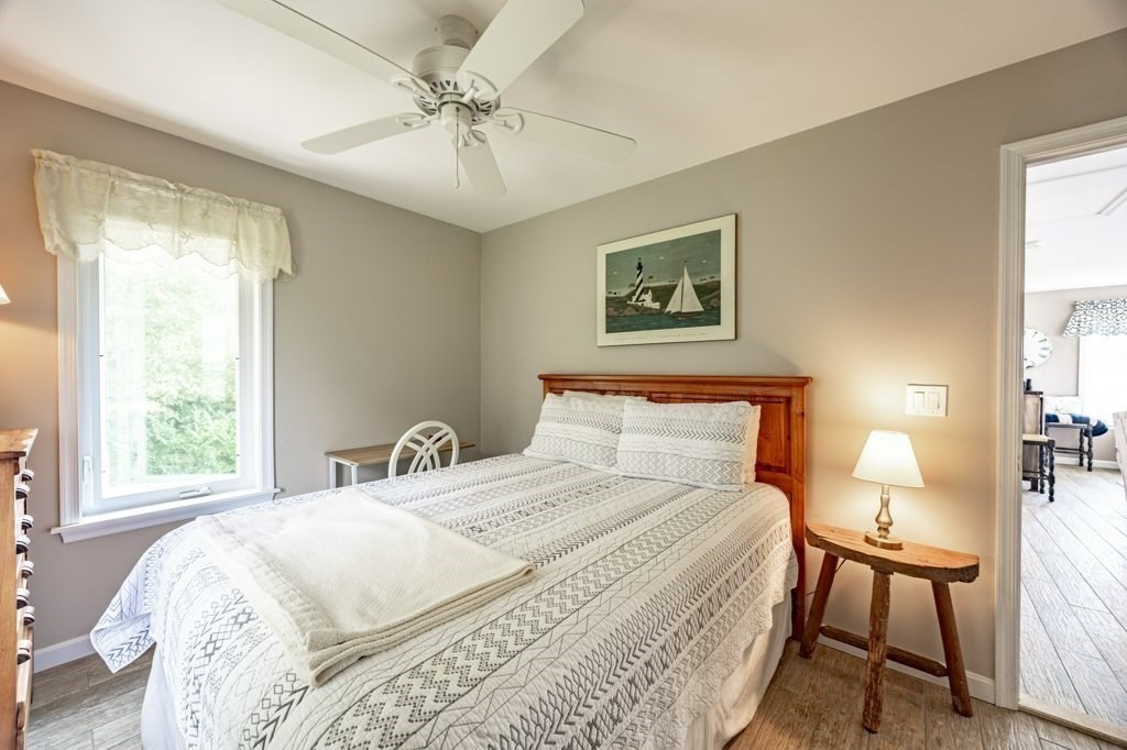 91 Balsam Street Fairhaven, MA 02719 - Photo 23 of 39 a bedroom with a bed and a table