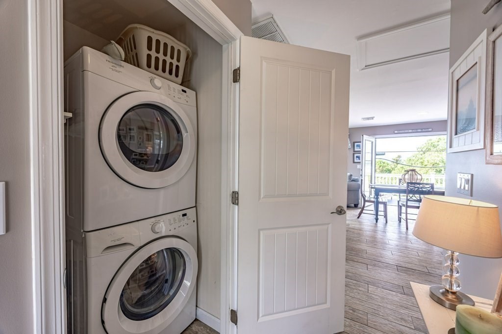 91 Balsam Street Fairhaven, MA 02719 - Photo 26 of 39 a view of a hallway with washer and dryer