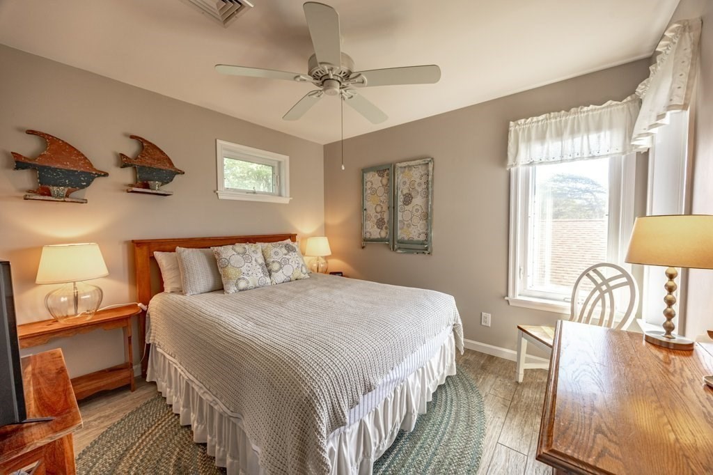 91 Balsam Street Fairhaven, MA 02719 - Photo 29 of 39 a bedroom with a bed a couch and dresser