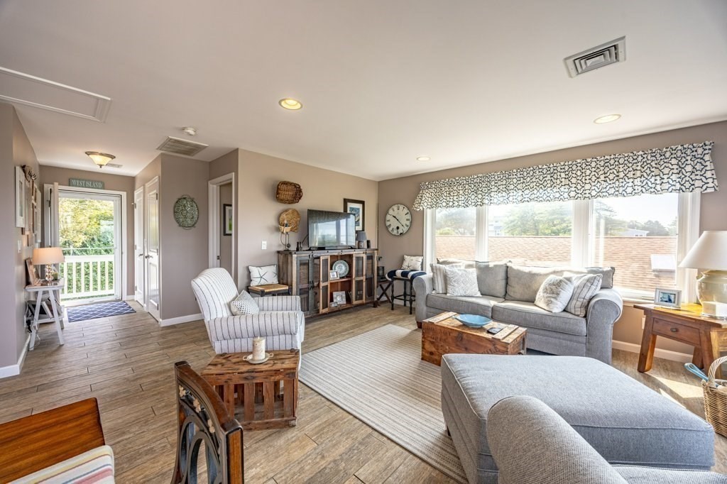 91 Balsam Street Fairhaven, MA 02719 - Photo 30 of 39 a living room with furniture or couch and a wooden floor