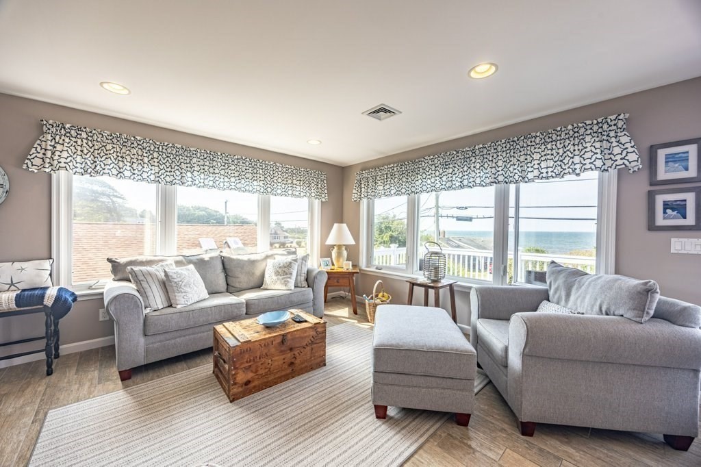 91 Balsam Street Fairhaven, MA 02719 - Photo 32 of 39 a living room with furniture and a large window