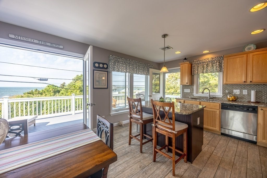 91 Balsam Street Fairhaven, MA 02719 - Photo 35 of 39 a very nice looking living room with a large window and dining table