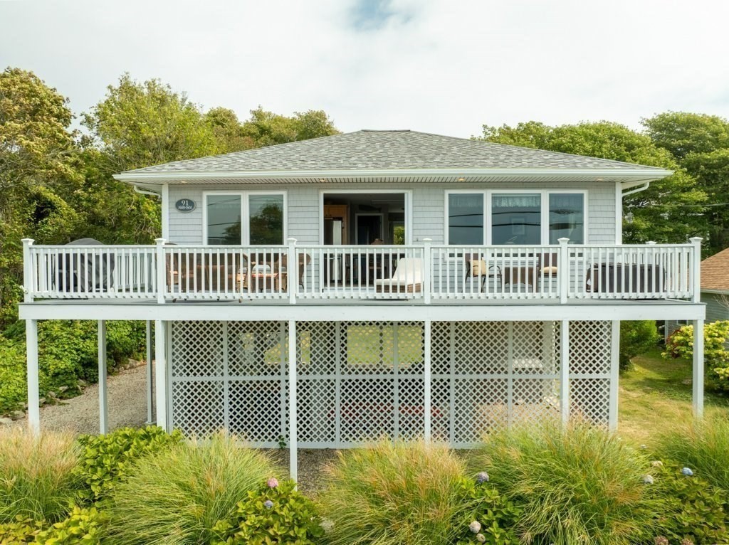 91 Balsam Street Fairhaven, MA 02719 - Photo 36 of 39 a front view of a house with a garden
