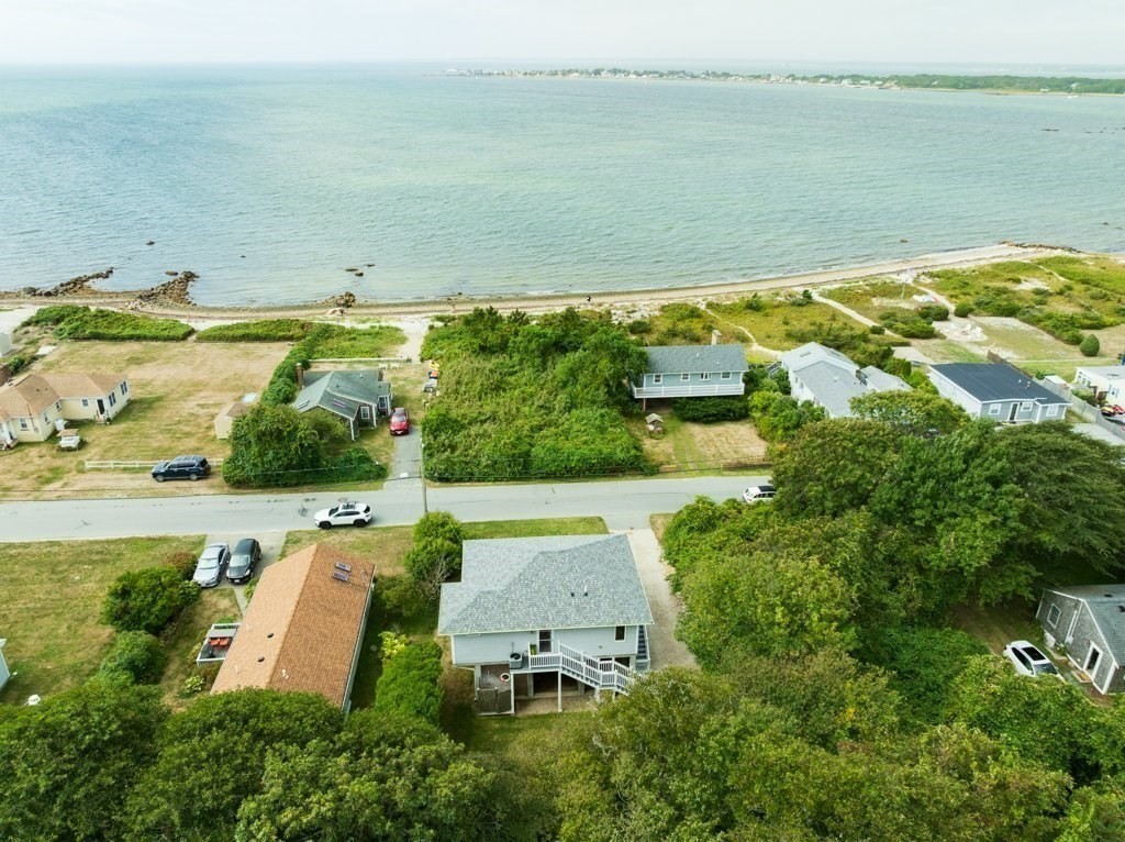 91 Balsam Street Fairhaven, MA 02719 - Photo 4 of 39 an aerial view of ocean with residential house and outdoor space