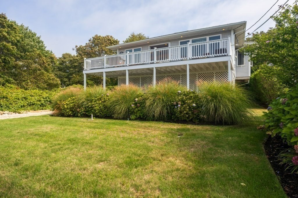 91 Balsam Street Fairhaven, MA 02719 - Photo 6 of 39 a front view of a house with garden