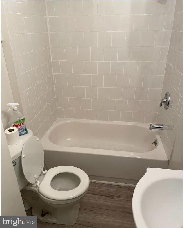 352 North Gross Street Philadelphia, PA 19139 - Photo 3 of 7 a bathroom with a sink and a mirror