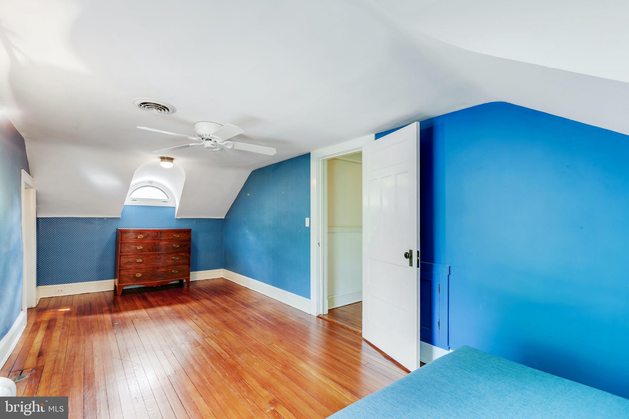 108 St Johns Road Baltimore, MD 21210 - Photo 62 of 97 6th bedroom with hardwood and ceiling fan