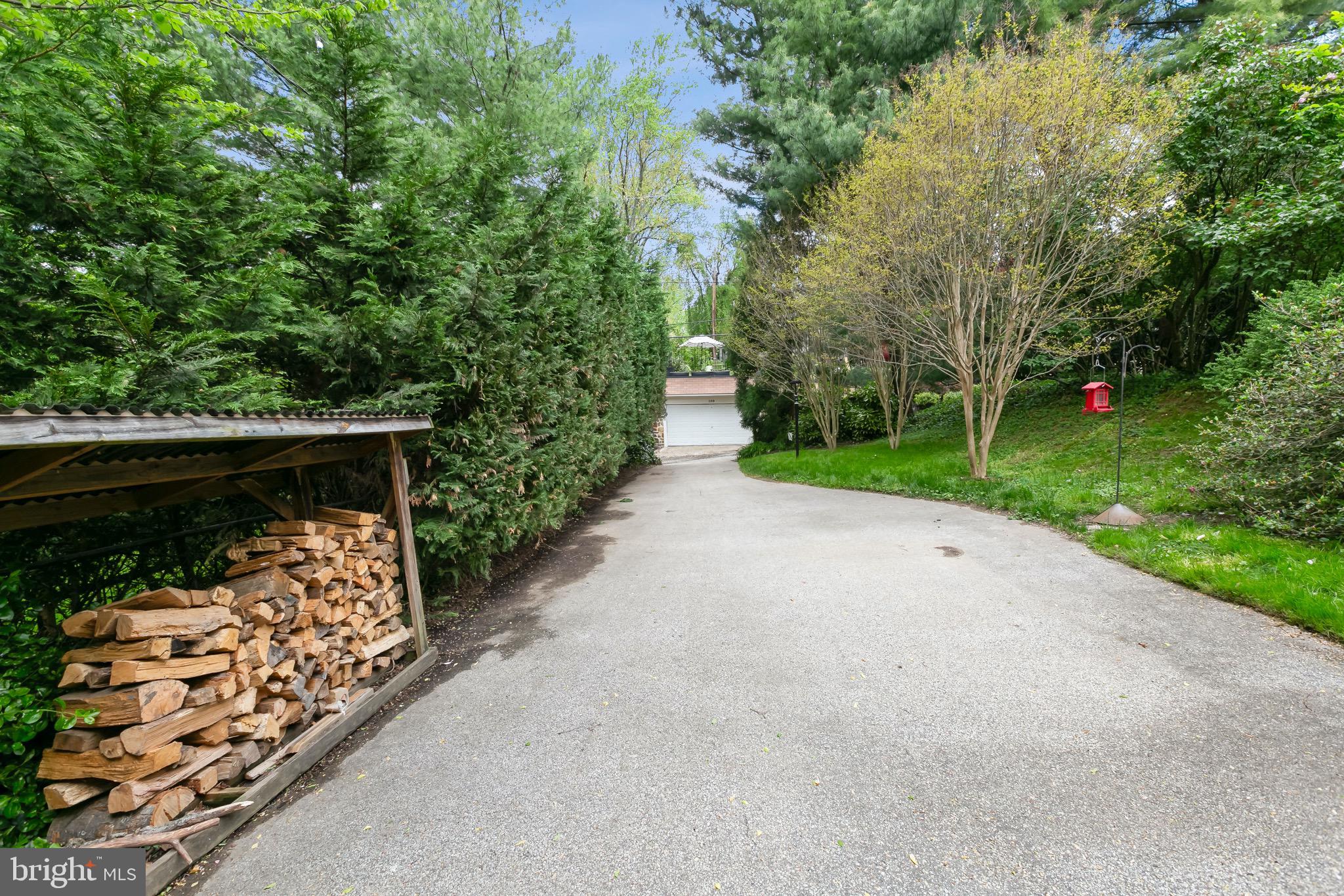 108 St Johns Road Baltimore, MD 21210 - Photo 79 of 97 Paved driveway and wood storage