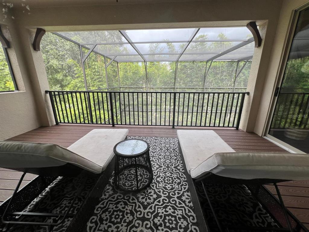 12927 Canopy Woods Way Winter Garden, FL 34787 - Photo 31 of 41 a balcony view with a seating space