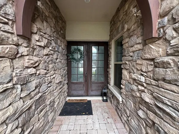a view of a pathway door of the house