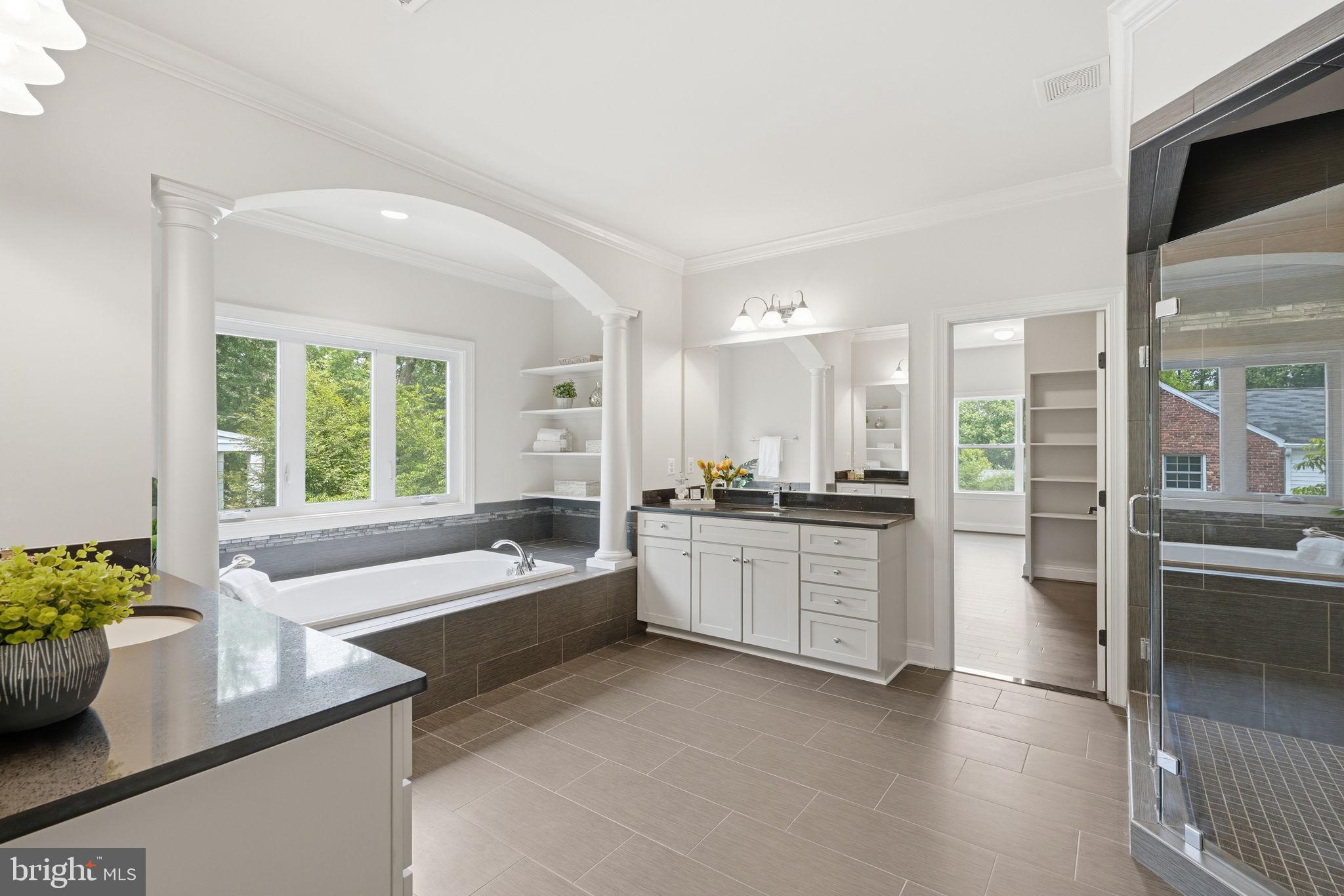 7821 Old Falls Road McLean, VA 22102 - Photo 28 of 62 a large white kitchen with a large window