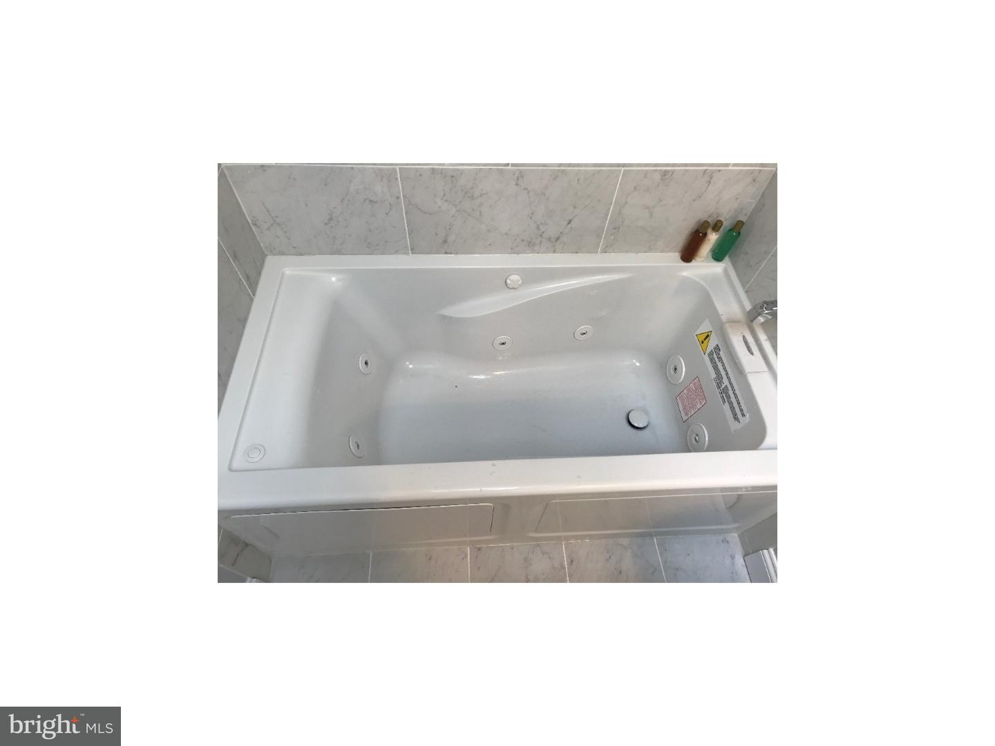 8663 Rugby Street Philadelphia, PA 19150 - Photo 14 of 25 Bathroom