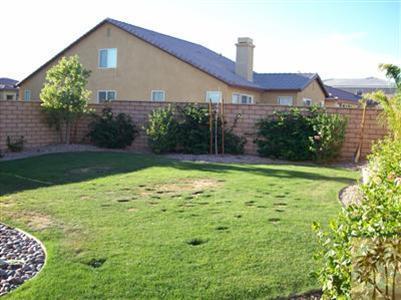 37454 Haweswater Road Indio, CA 92203 - Photo 20 of 25 a front view of a house with garden