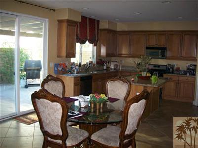37454 Haweswater Road Indio, CA 92203 - Photo 3 of 25 a view of a dining room with furniture window and outside view