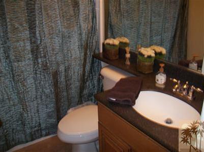 37454 Haweswater Road Indio, CA 92203 - Photo 9 of 25 a bathroom with a toilet sink and mirror