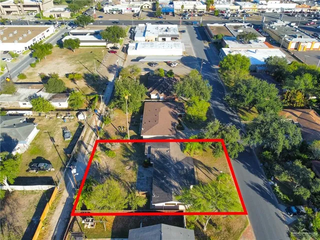 an aerial view of swimming pool patio and mountain view