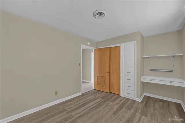 a kitchen with sink cabinets and window