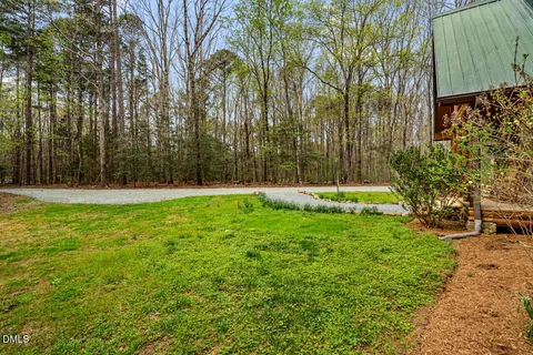 a kitchen with stainless steel appliances granite countertop a stove refrigerator and a sink