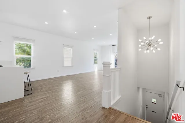 a view of kitchen with window and wooden floor