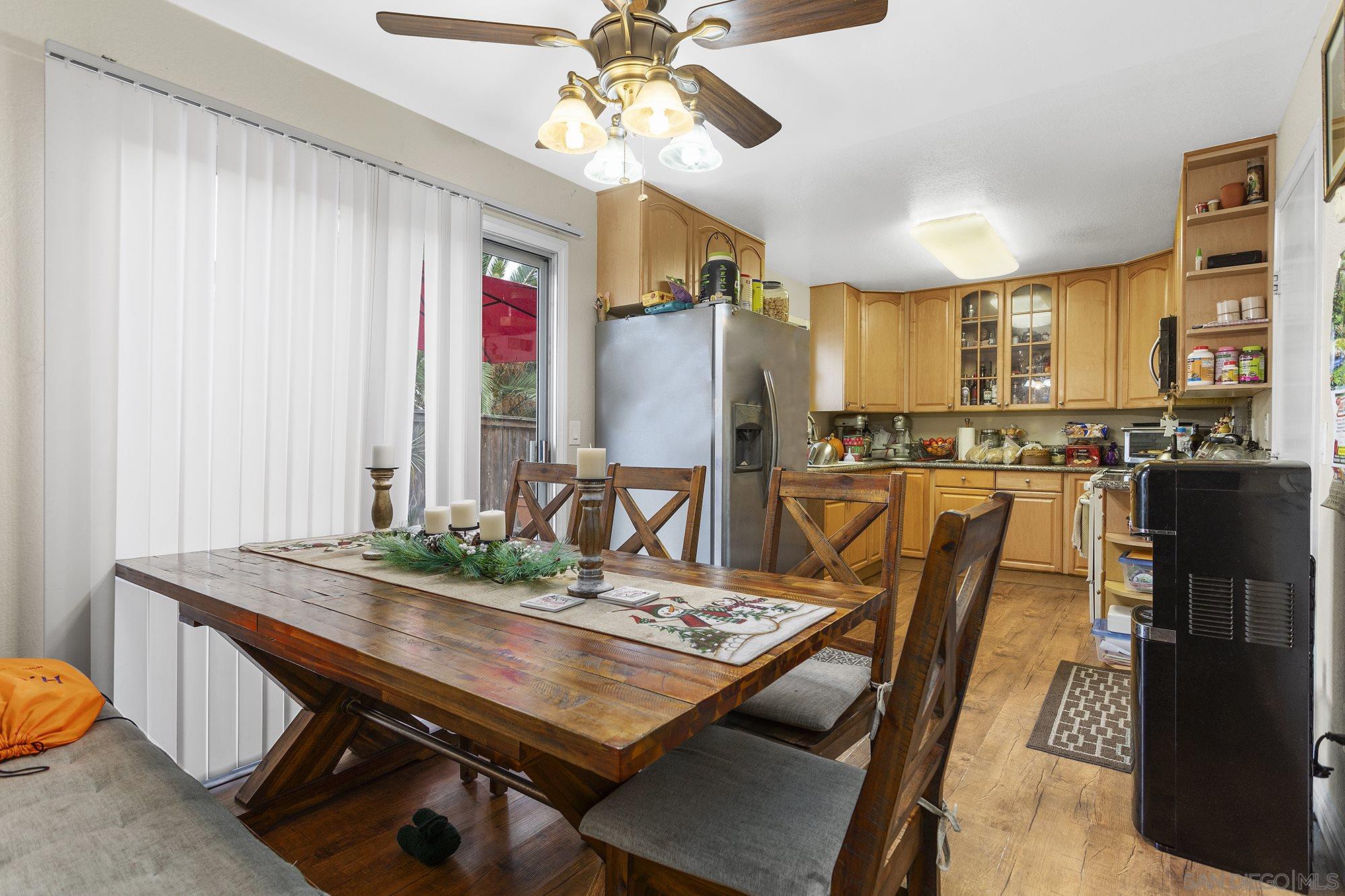2810 Rosedale Place Spring Valley, CA 91977 - Photo 31 of 48 a view of a dining room with furniture window and wooden floor