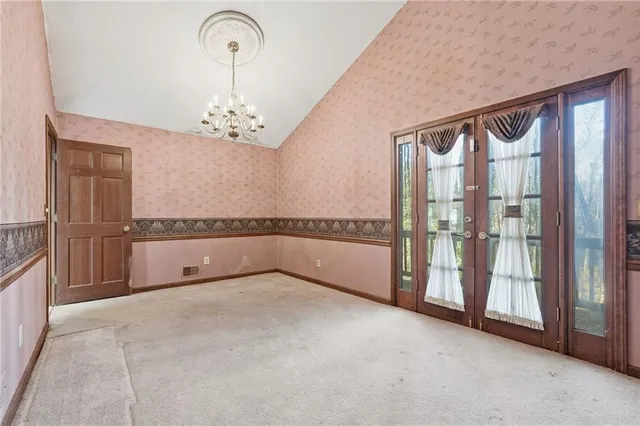 a view of a livingroom with a staircase