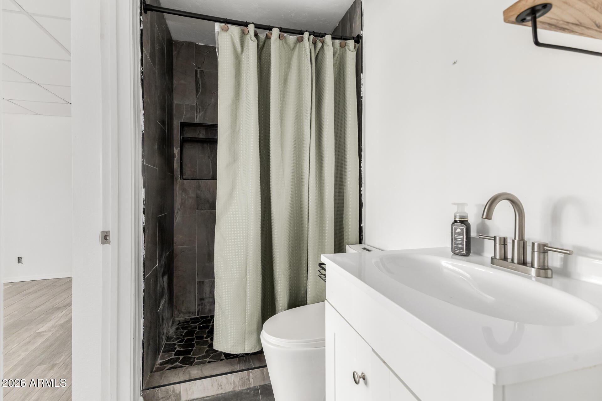 801 East Ruth Avenue Phoenix, AZ 85020 - Photo 15 of 35 a bathroom with a sink and toilet