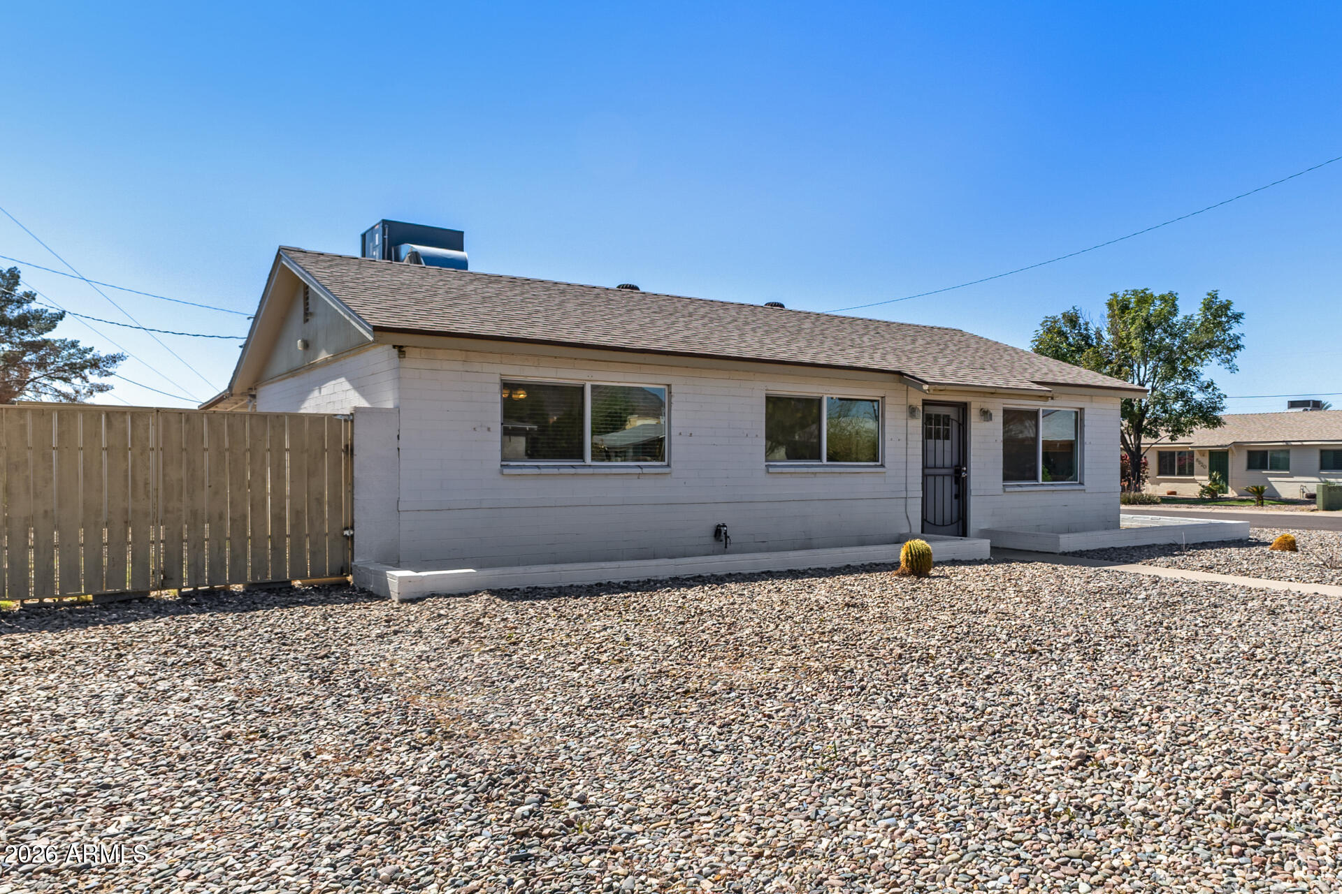 801 East Ruth Avenue Phoenix, AZ 85020 - Photo 3 of 35 a front view of a house with a yard