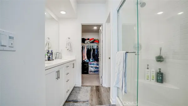 a bathroom with a shower and a shower
