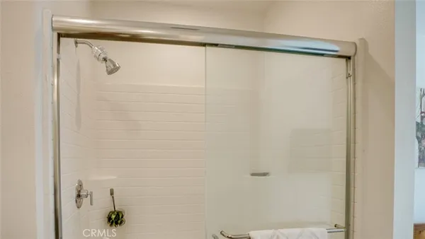 a bedroom with a bed and a cabinets