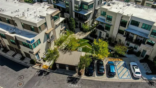 a aerial view of a multi story residential apartment building