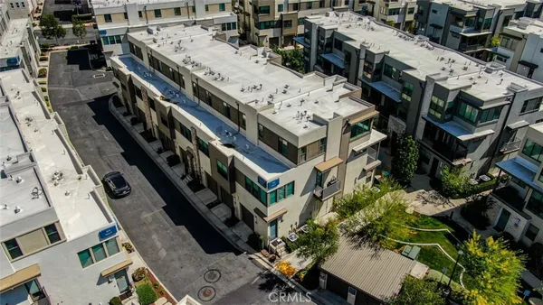 a aerial view of a multi story building