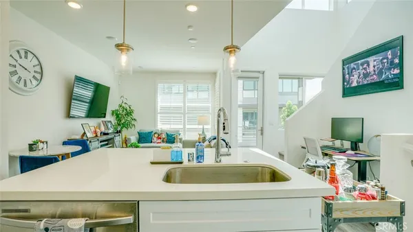 a kitchen that has a stove and a table