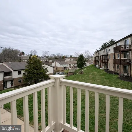 a view of a city from a balcony